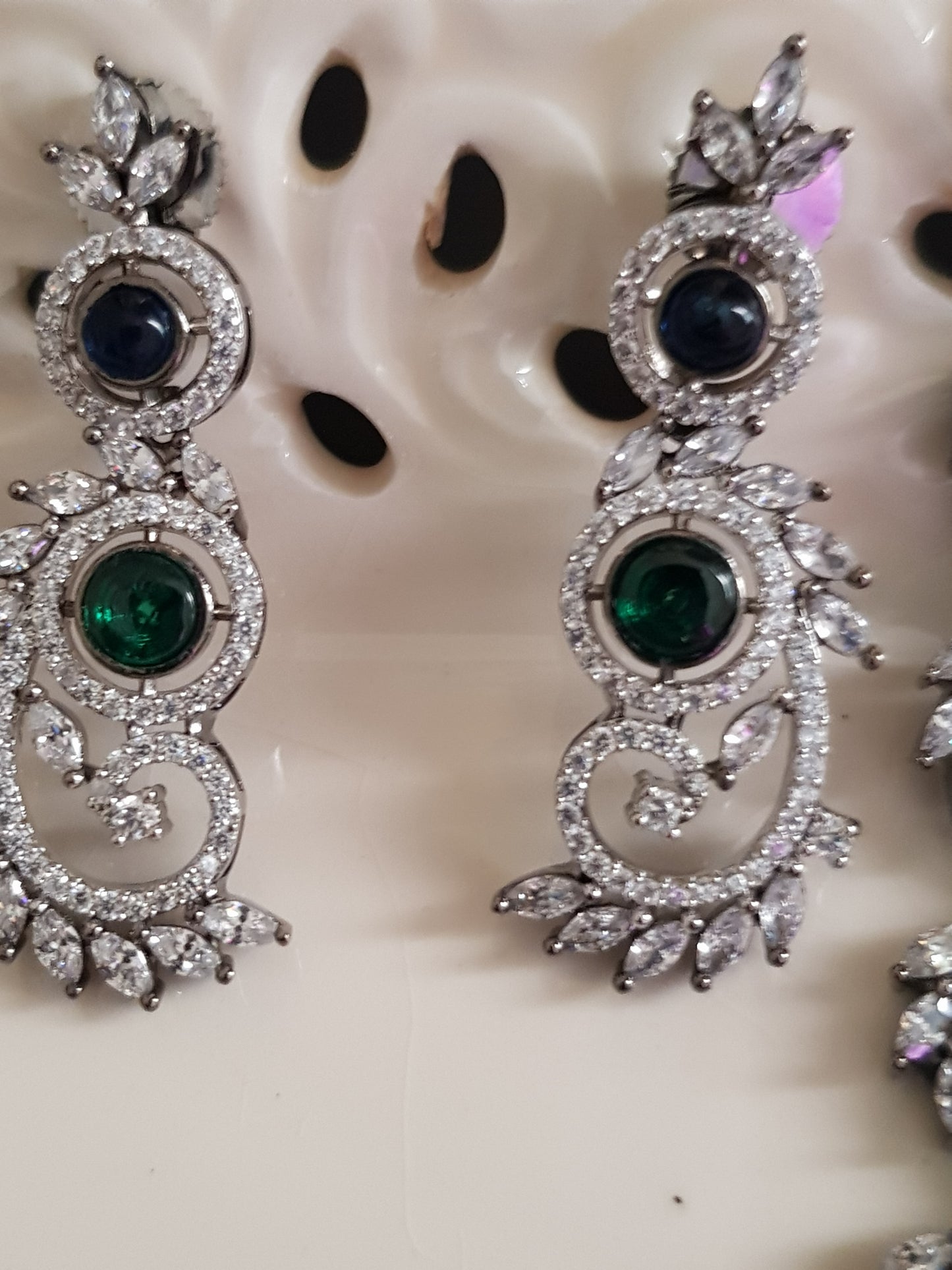 Silver Finish set with elongated C shaped pieces with emerald/sapphire and CZ detailing , matching earrings