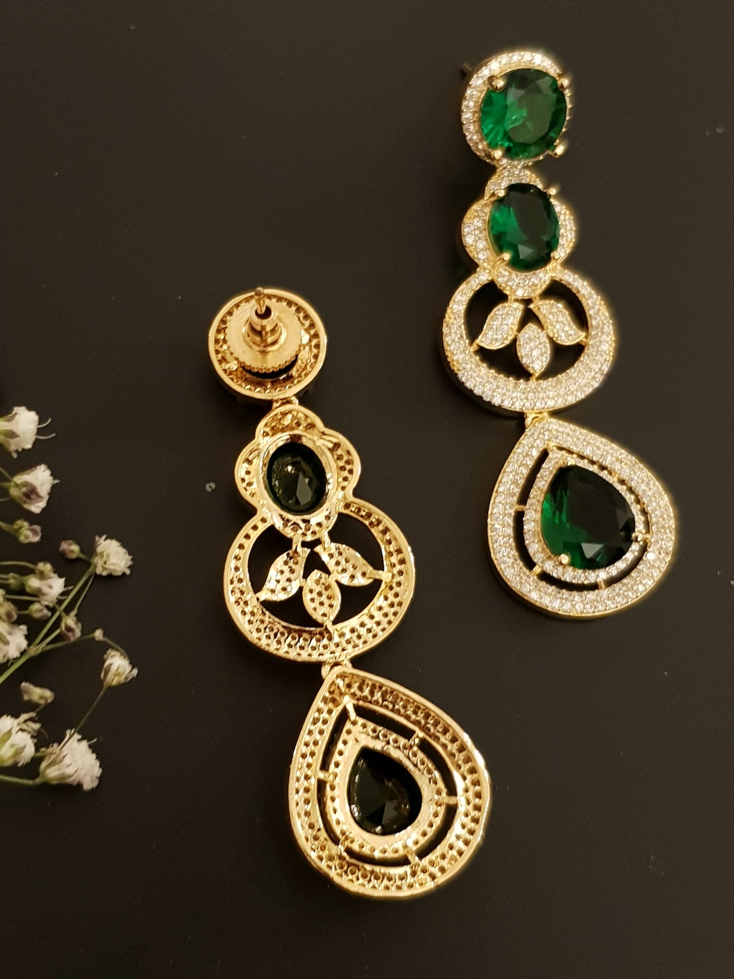 Gold finish set with long necklace in round CZ and emerald pieces, matching earrings