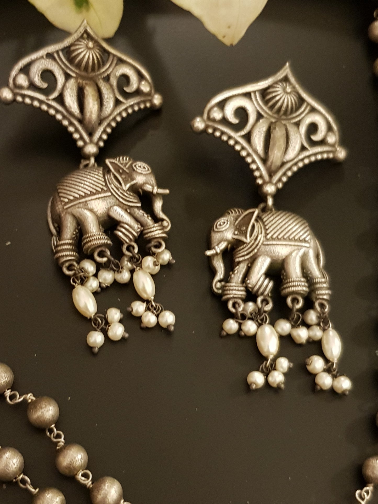 Silver finish set, elephant with jaali design umbrella pendant, matching earrings