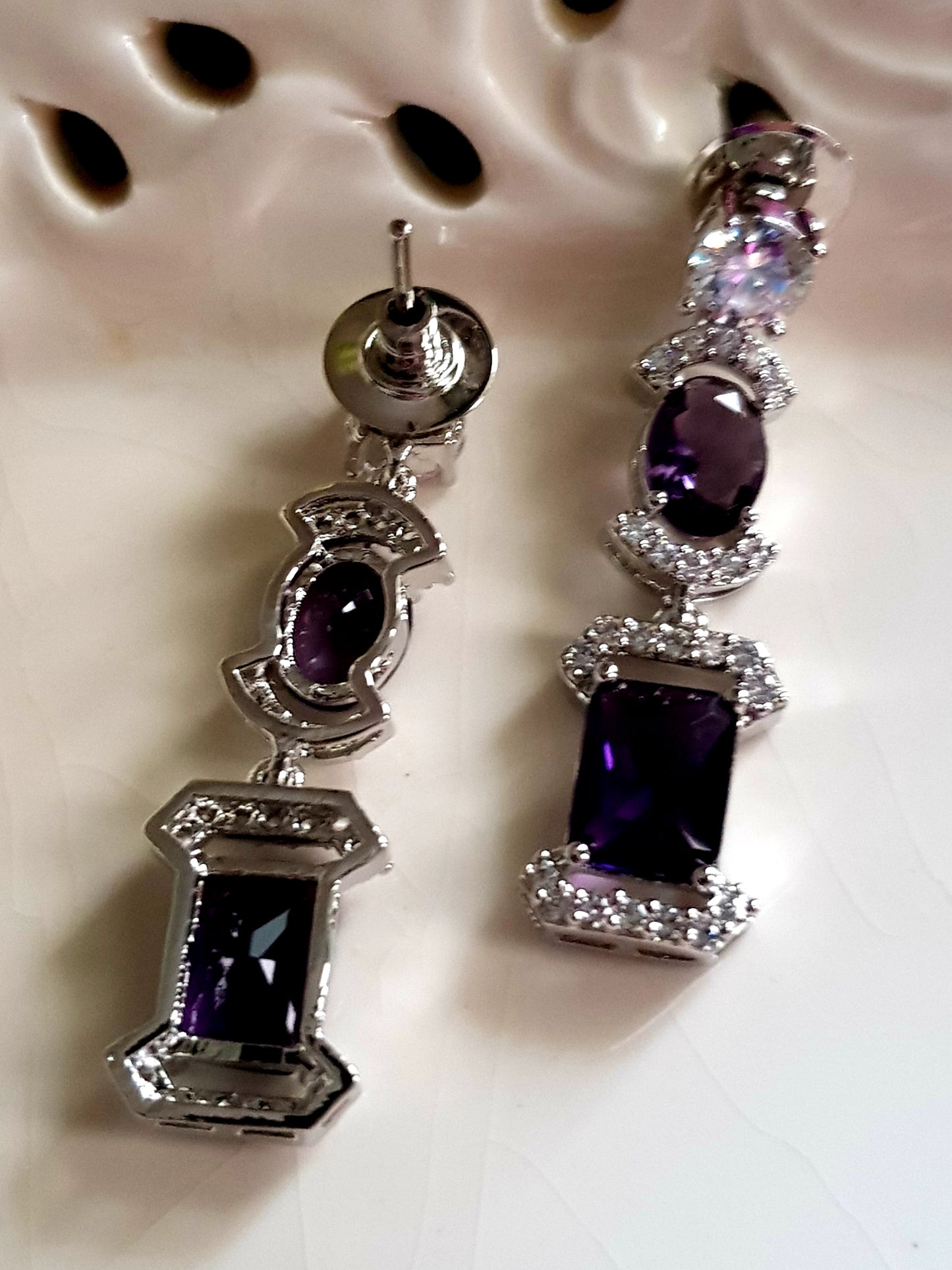 Platinum finish set, amethyst and CZ stones, set in single strand long necklace, matching earrings