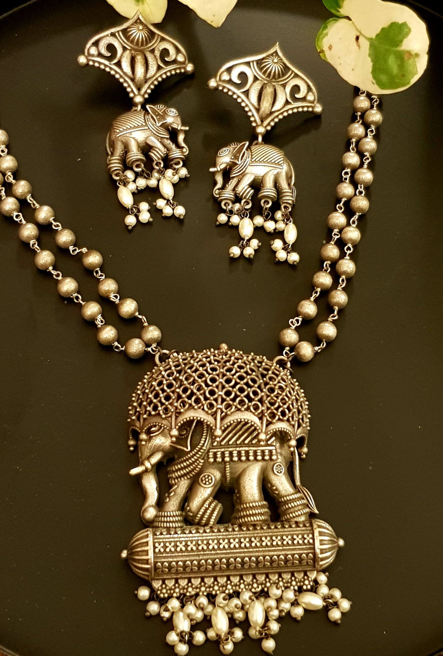 Silver finish set, elephant with jaali design umbrella pendant, matching earrings