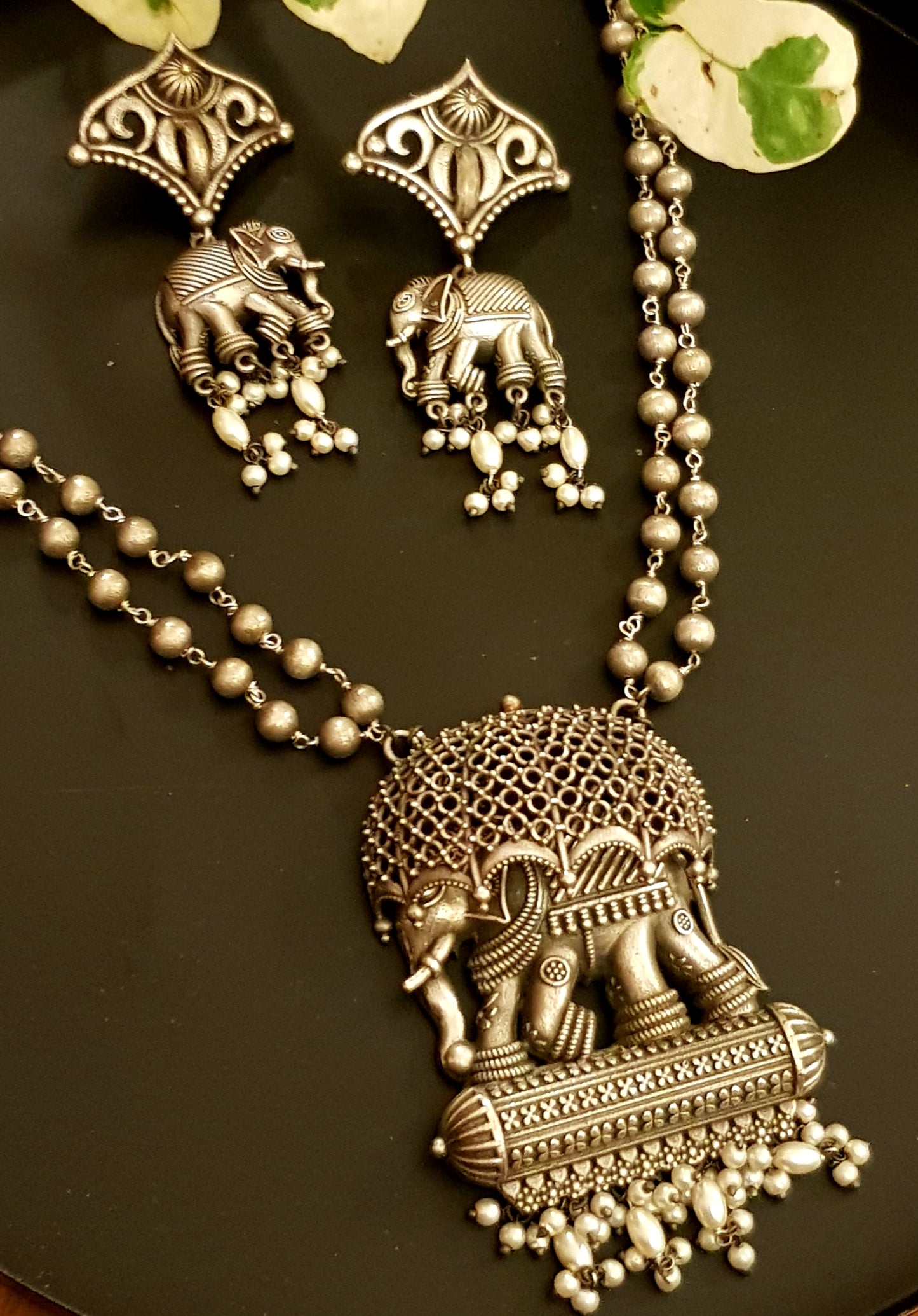 Silver finish set, elephant with jaali design umbrella pendant, matching earrings