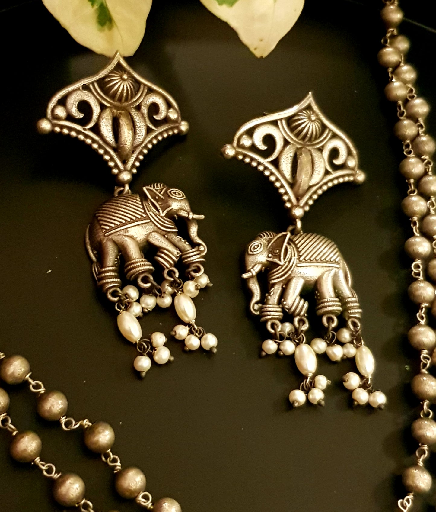 Silver finish set, elephant with jaali design umbrella pendant, matching earrings