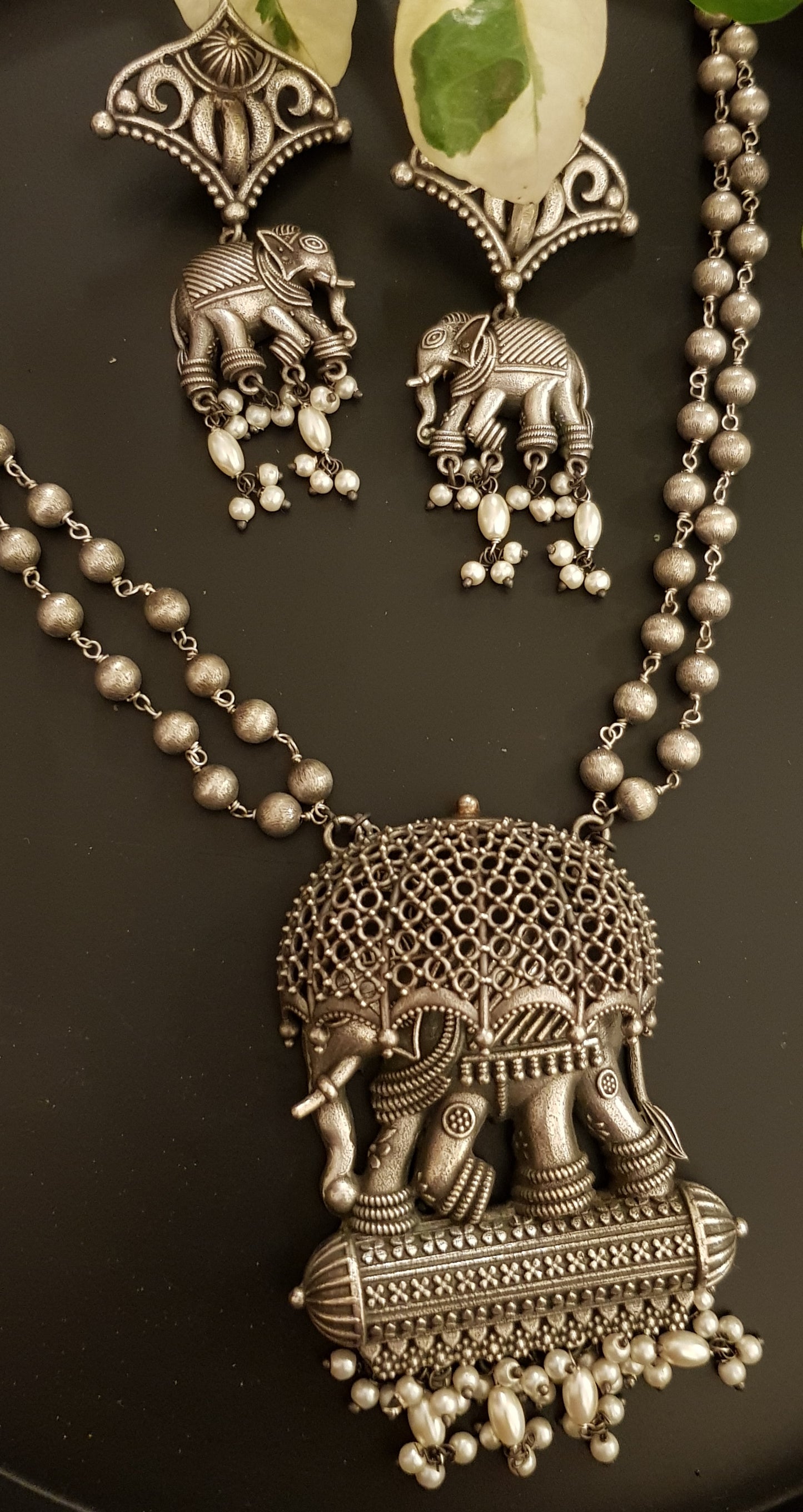 Silver finish set, elephant with jaali design umbrella pendant, matching earrings