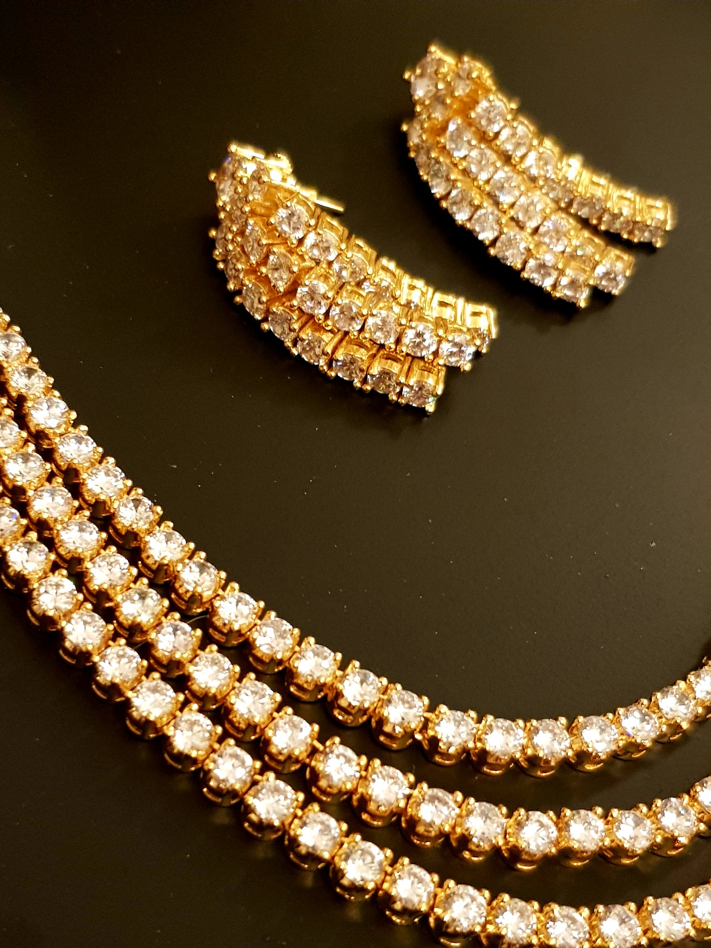 Gold finish set, triple strand round CZ necklace , matching earrings