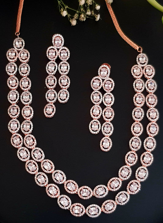 Rose gold finish set, double strand necklace in oval shape CZ, matching danglers (earrings)