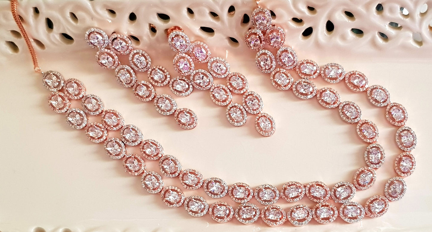 Rose gold finish set, double strand necklace in oval shape CZ, matching danglers (earrings)