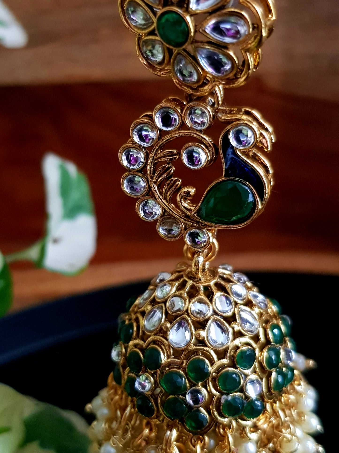 Long kundan and greenstone jhumki (earrings)