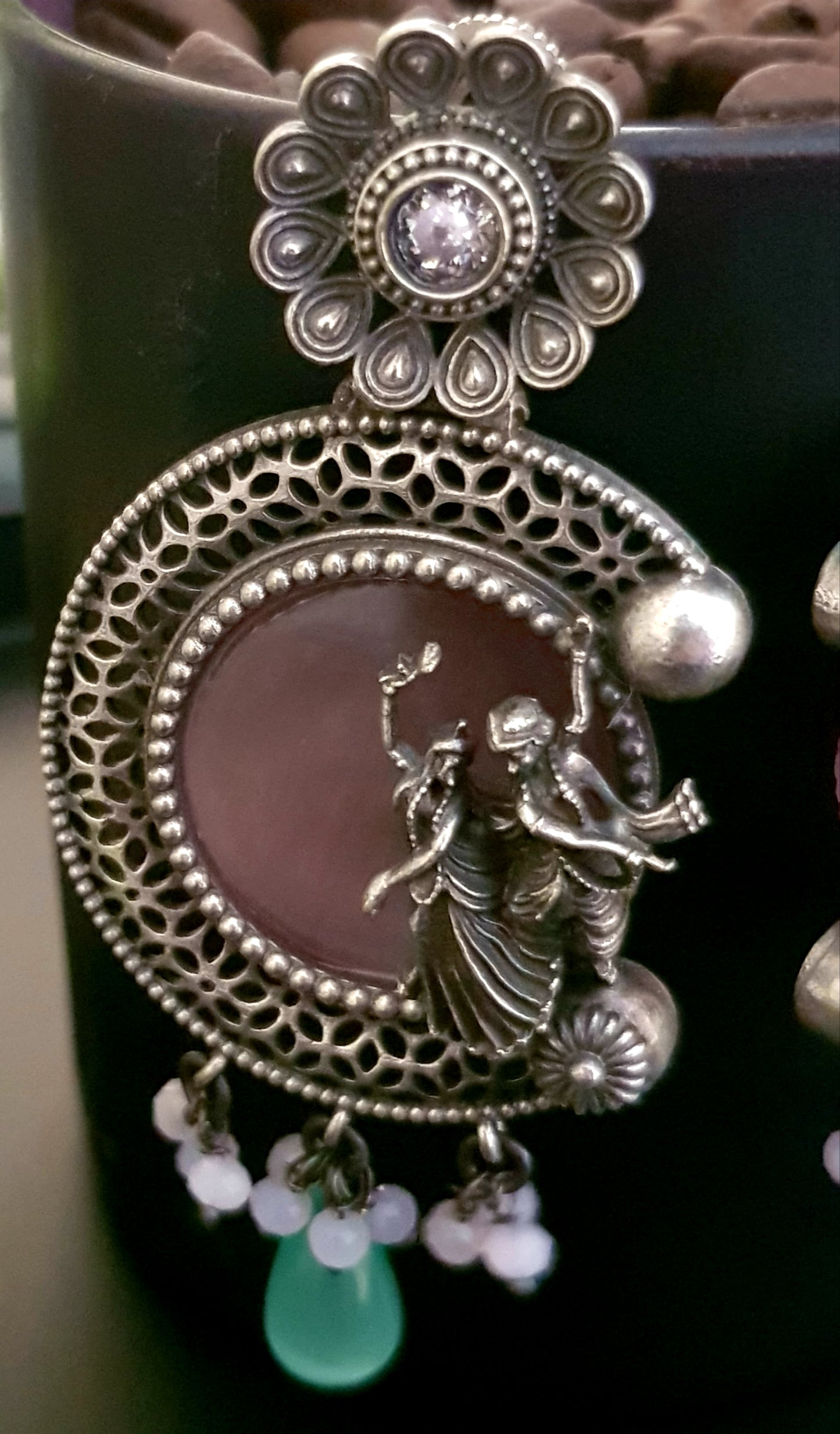 Silver finish set, dancing Radha-Krishna design over pink stone pendant with pearls, matching earrings