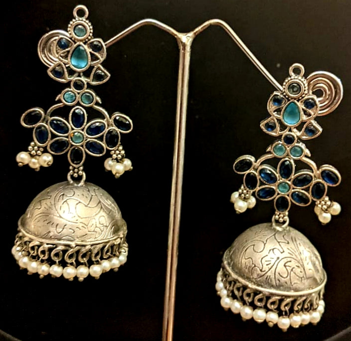 Antique silver finish set, silver flowers big pendant necklace with blue stone and pearl detailing, matching jhumkis (earrings)