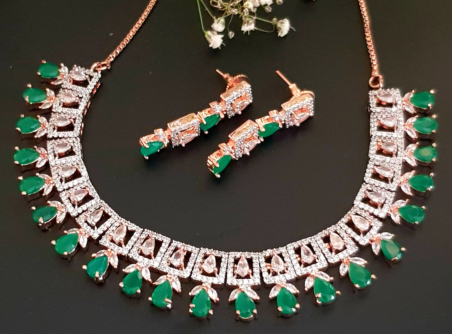 Rose gold finish set, necklace with CZ pieces and emerald drops, matching earrings