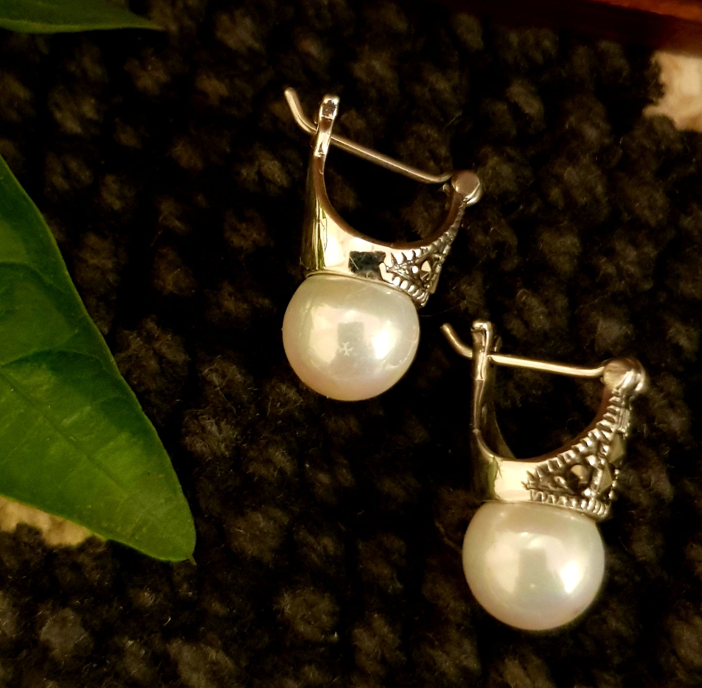 Silver earrings with marcasite and pearl at bottom