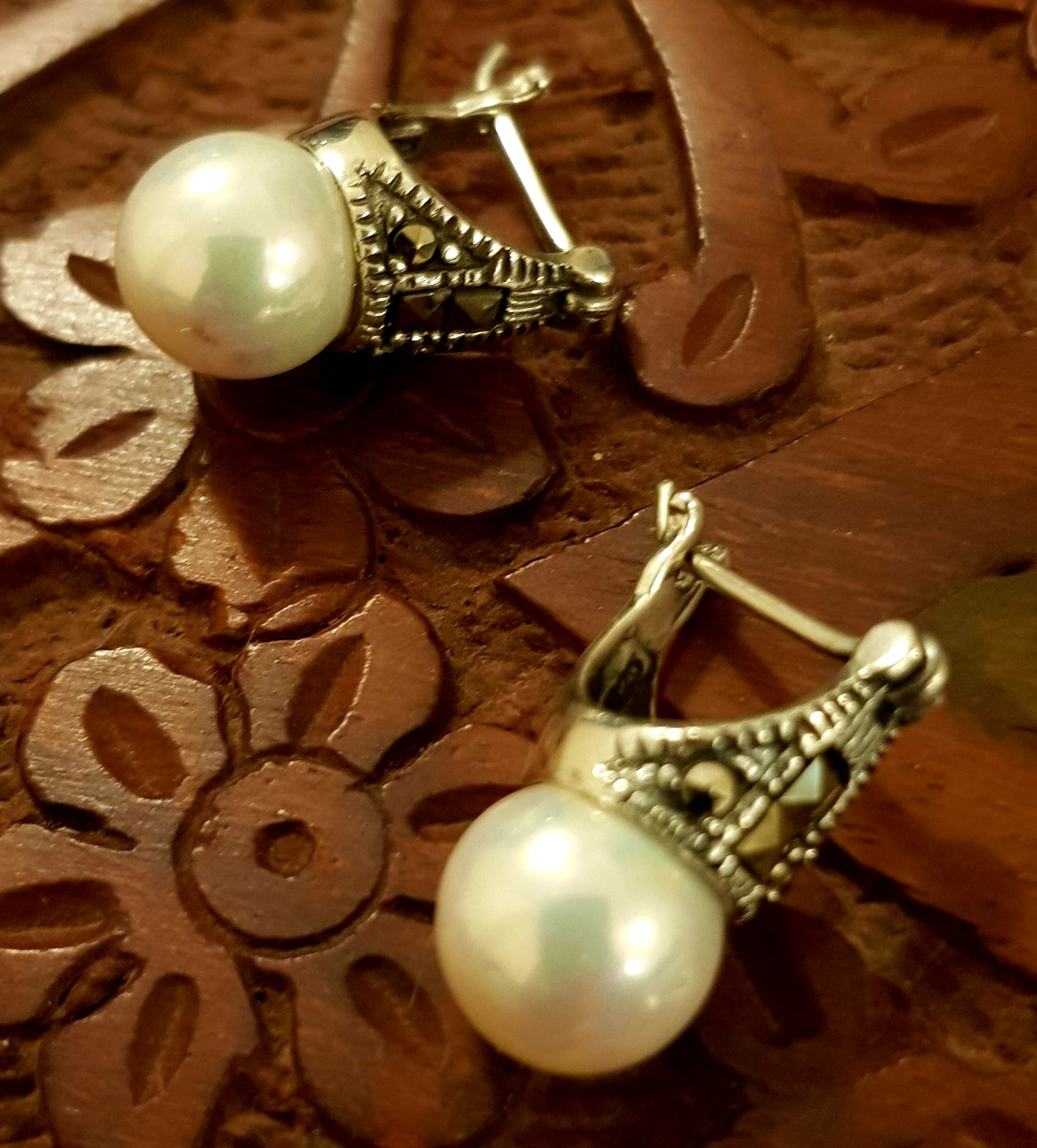 Silver earrings with marcasite and pearl at bottom