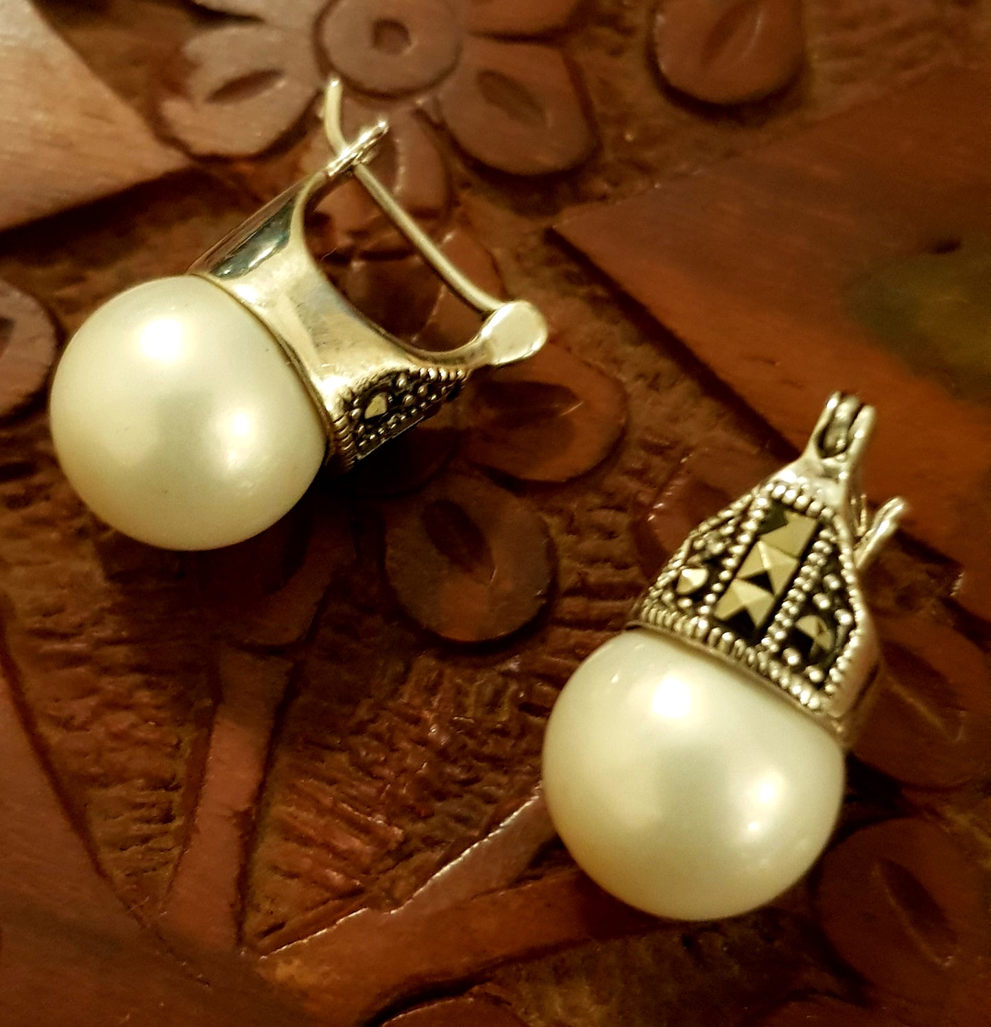 Silver earrings with marcasite and pearl at bottom