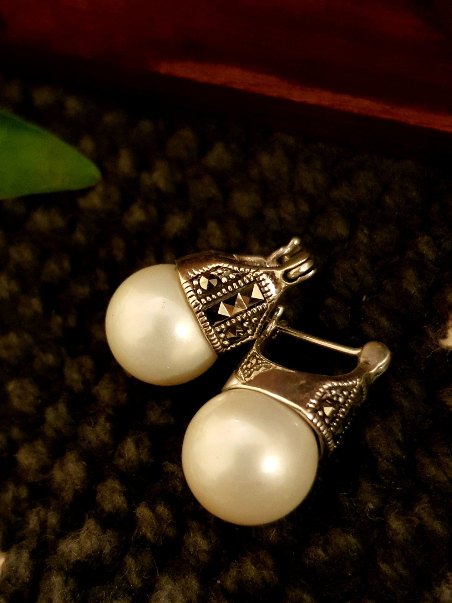 Silver earrings with marcasite and pearl at bottom