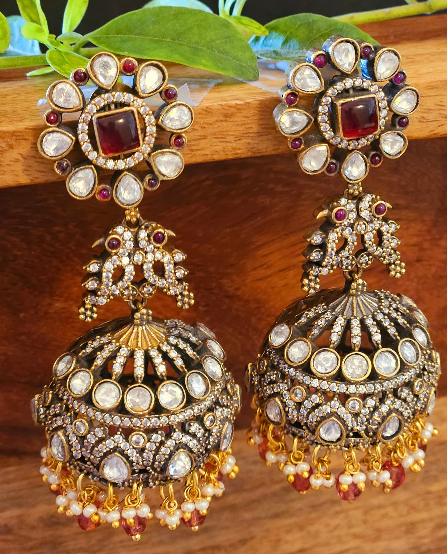 Antique gold finish kundan Jhumka (earrings), pair of parrots above ruby, kundan and CZ dome