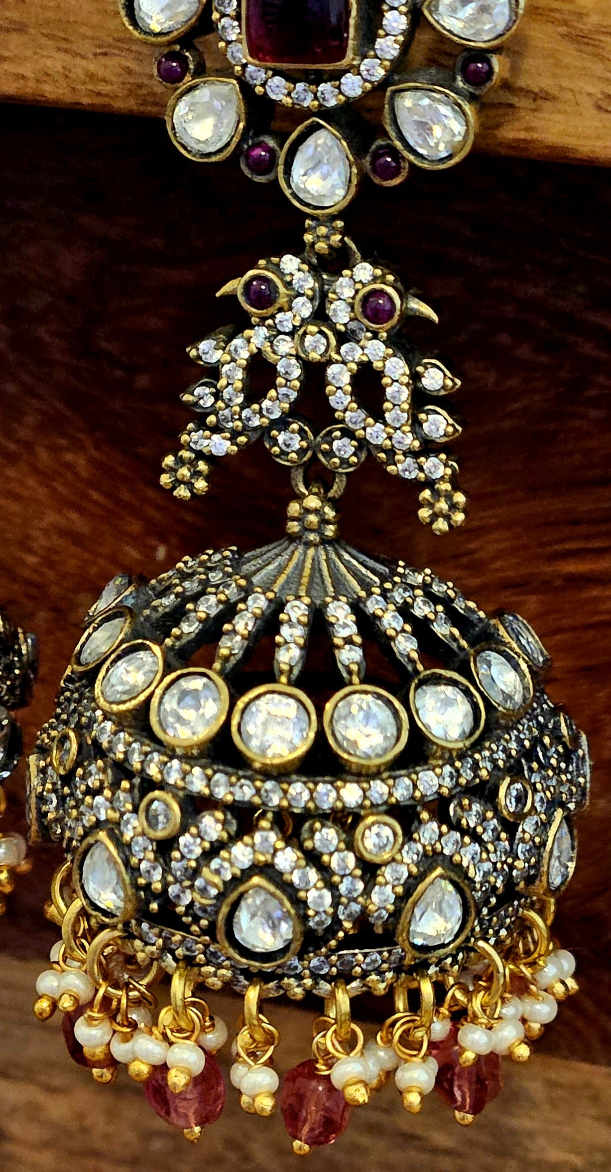 Antique gold finish kundan Jhumka (earrings), pair of parrots above ruby, kundan and CZ dome