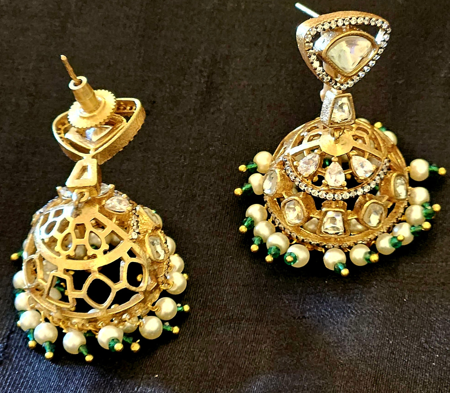 Antique gold finish kundan jhumka (earrings) with CZ and pearl hangings at the bottom of dome, kundan stud