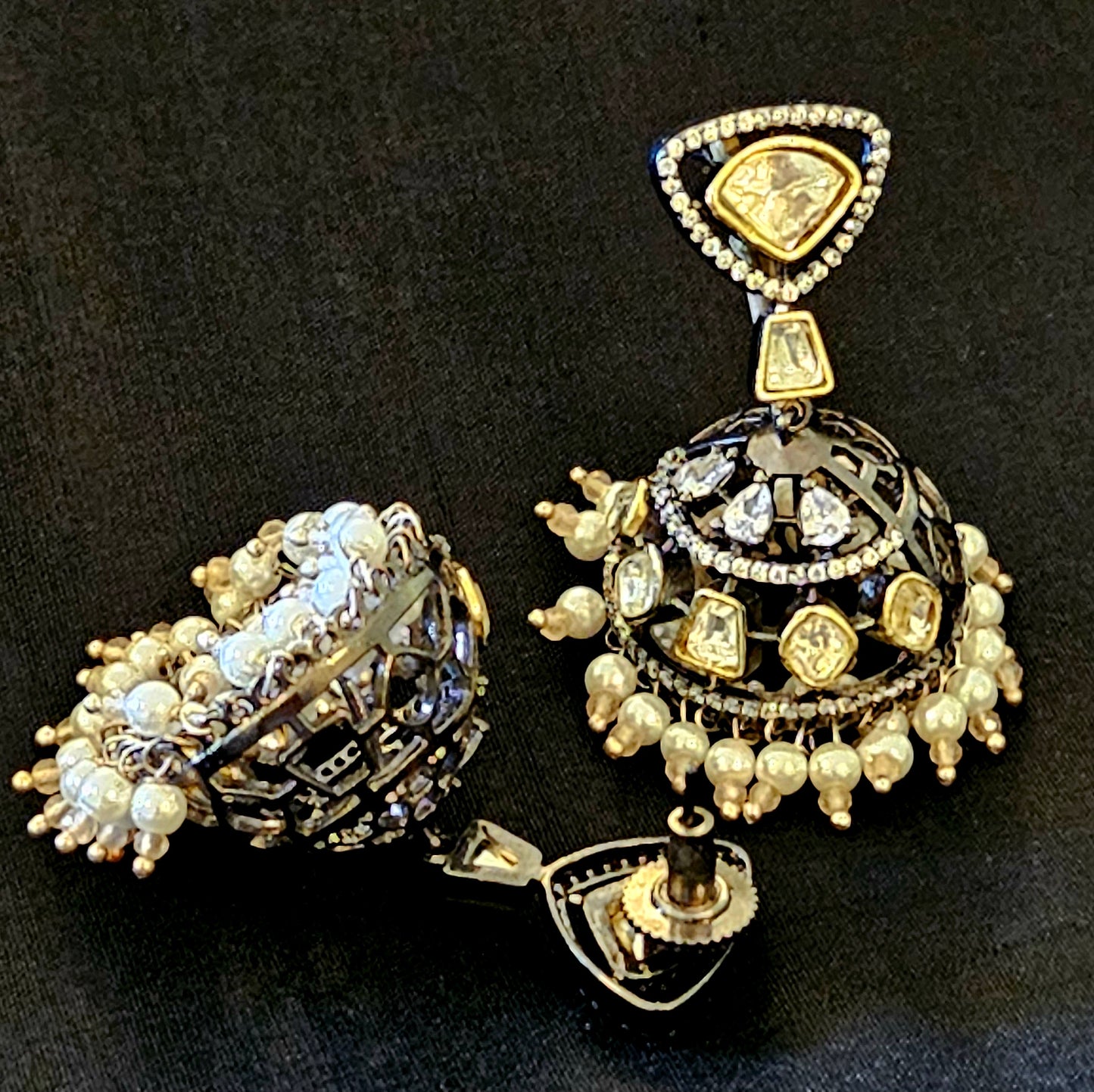 Antique gold finish kundan jhumka (earrings) with CZ and pearl hangings at the bottom of dome, kundan stud