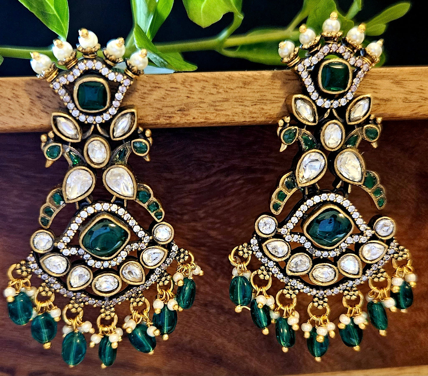 Long antique gold finish victorian earrings,crown stud above pair of peacock, CZ and green stone detailing