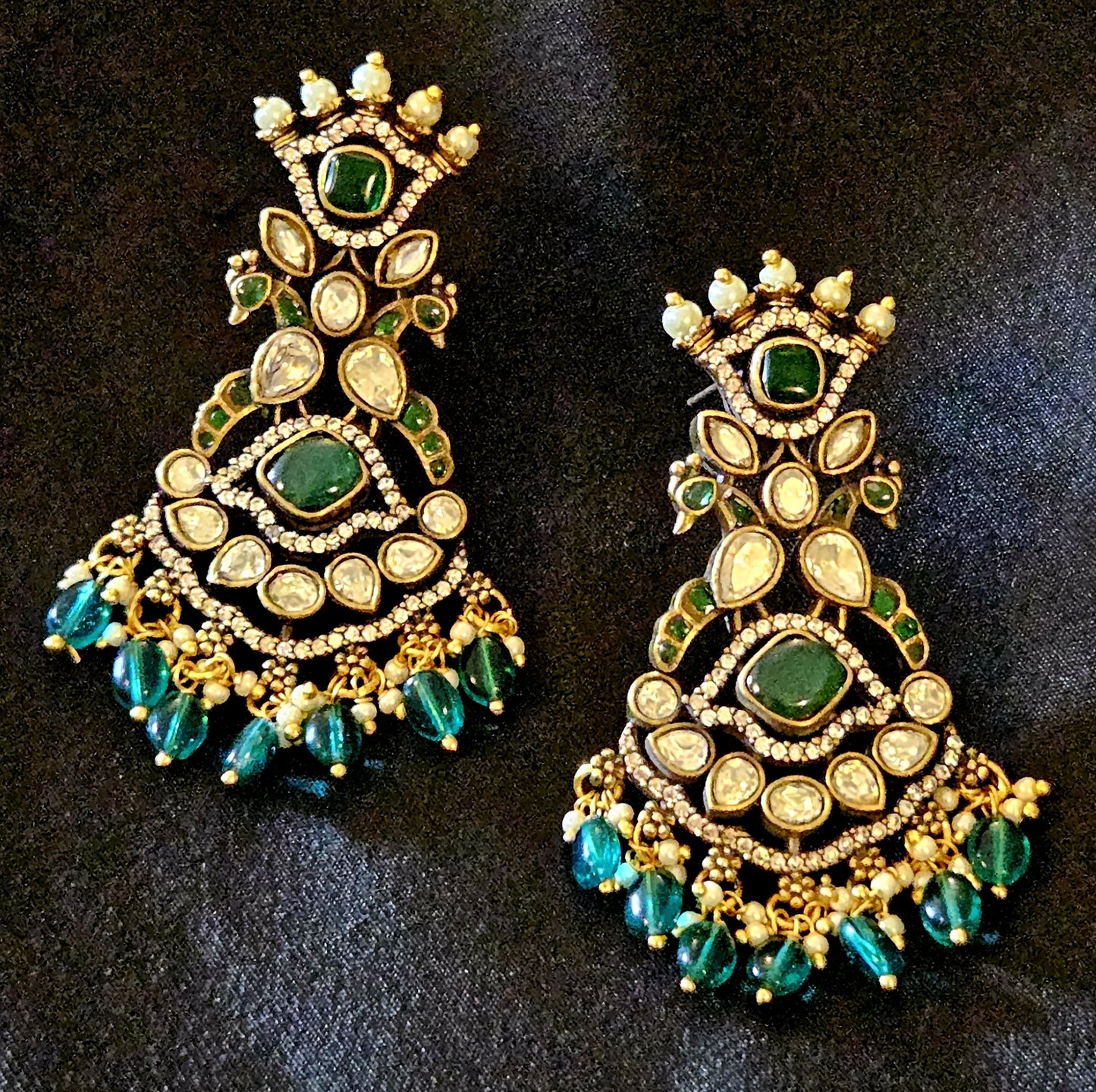 Long antique gold finish victorian earrings,crown stud above pair of peacock, CZ and green stone detailing