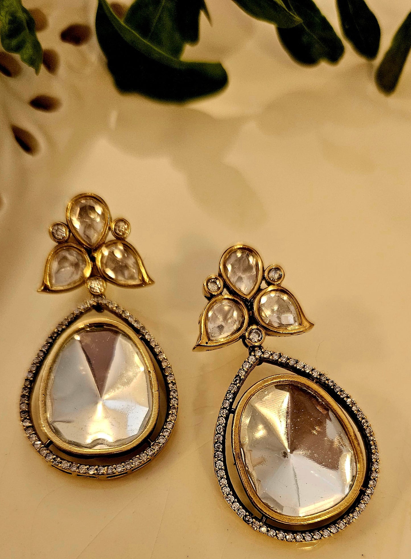 Antique finish kundan teardrop earrings with CZ framing on tri-petal flower kundan stud