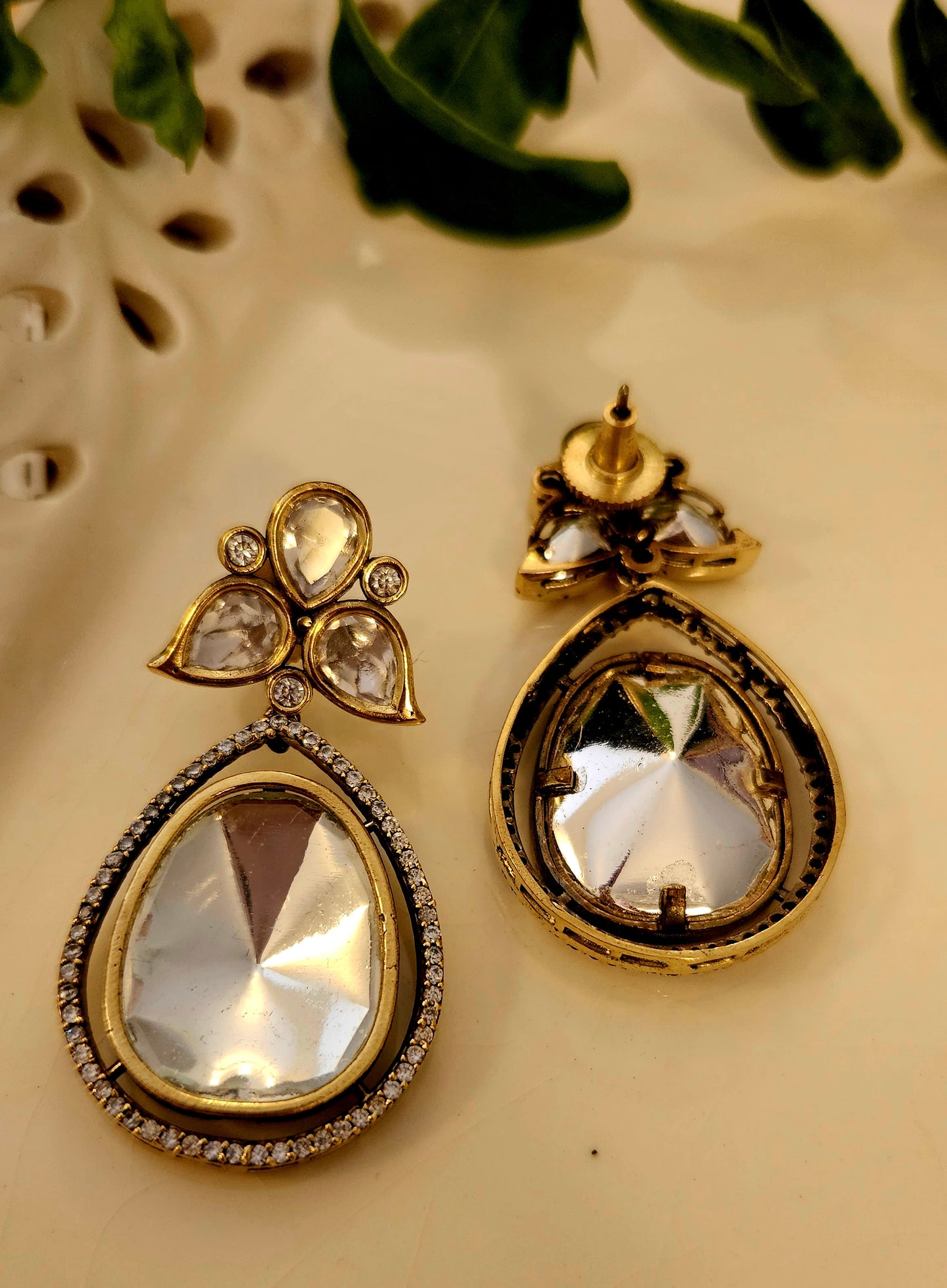 Antique finish kundan teardrop earrings with CZ framing on tri-petal flower kundan stud