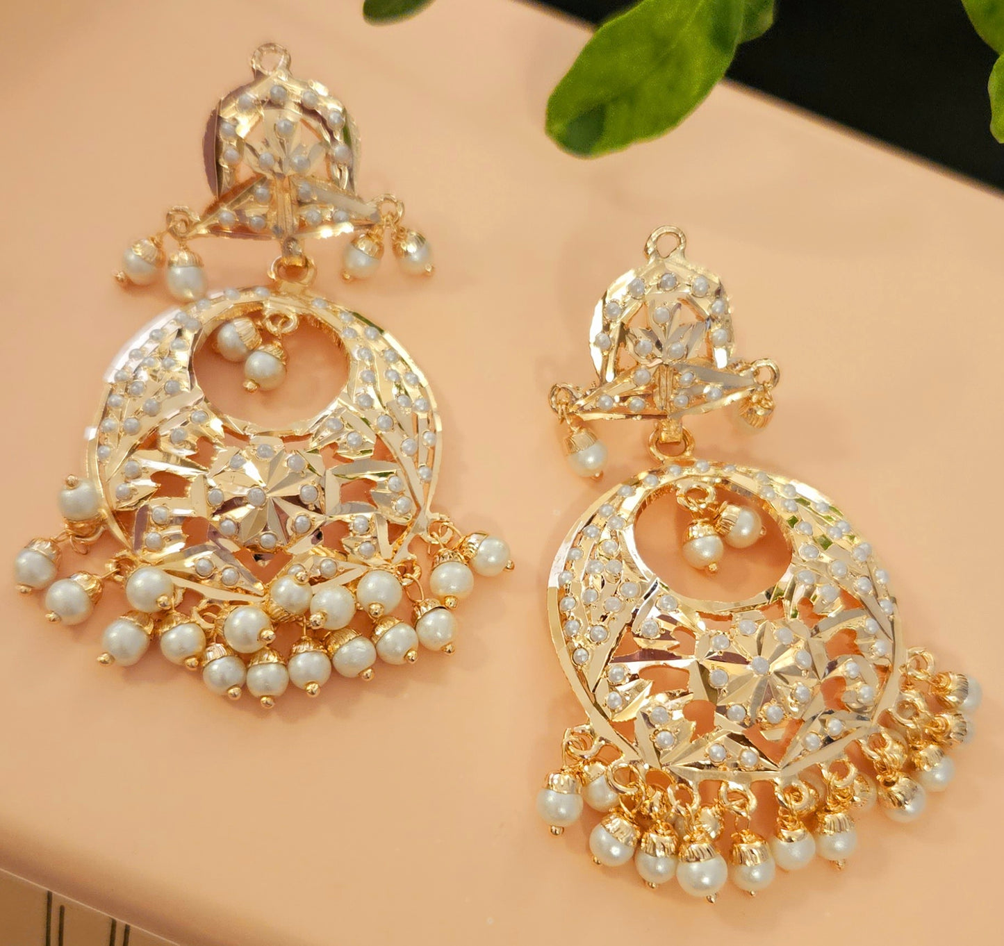 Gold finish, Jadau chandbaali earrings with pearl inlay