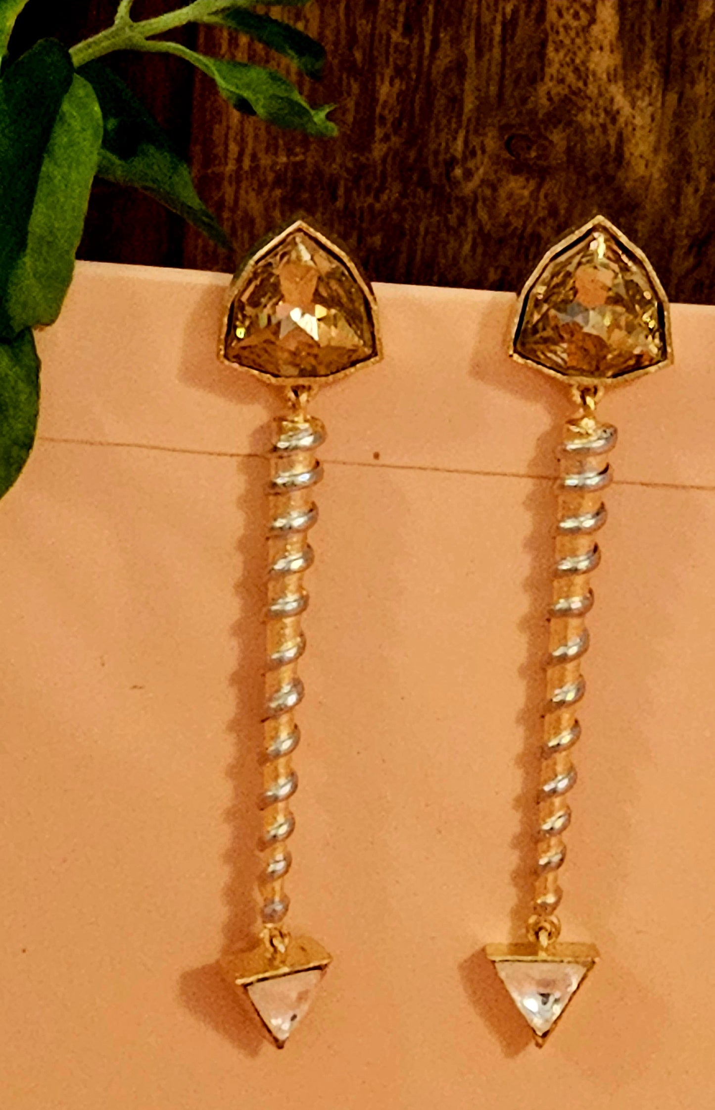 Silver finish long screw design earrings with triangle shaped blue/peach crystal stud and small triangle shaped clear stone at bottom