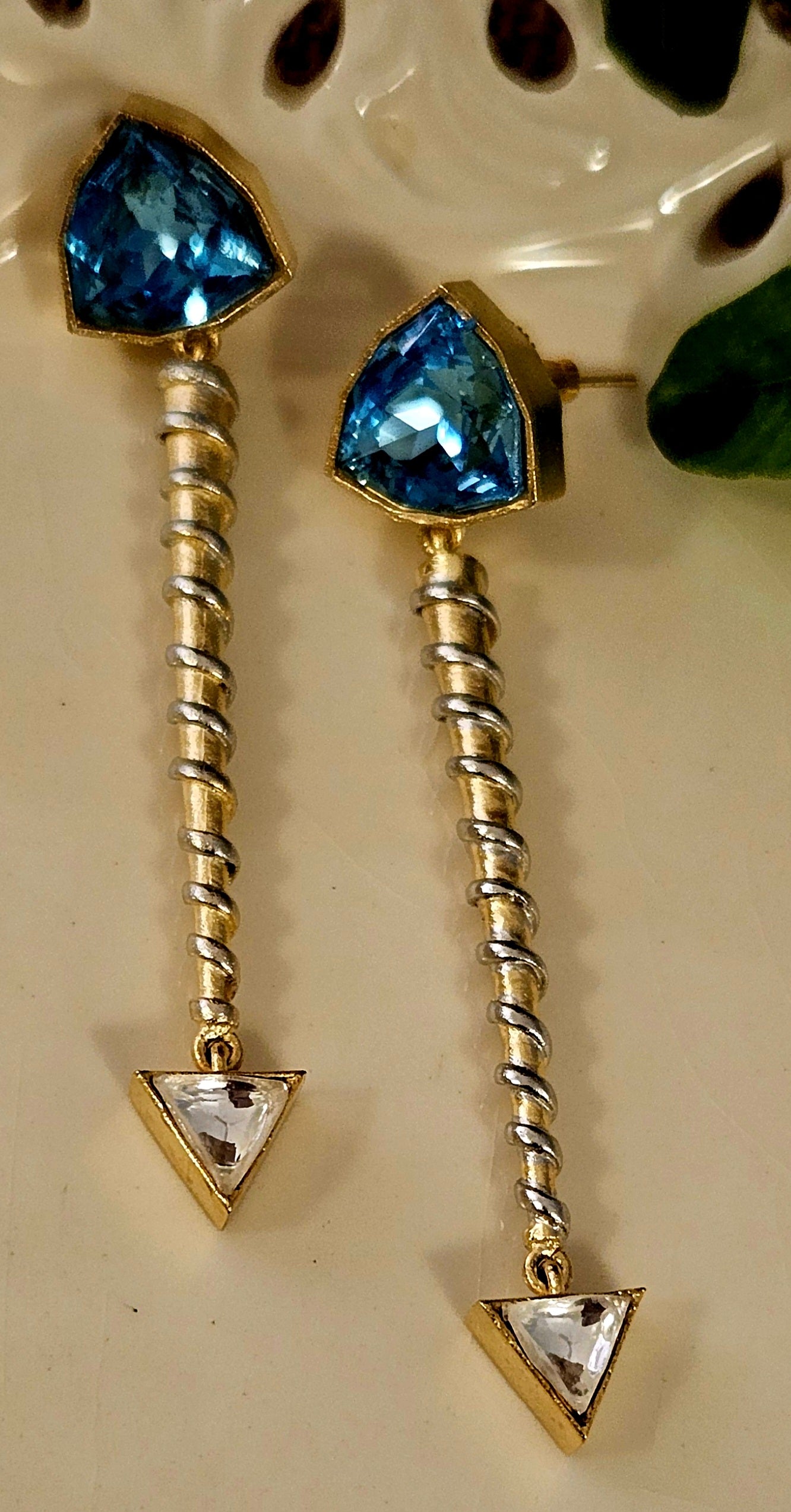 Silver finish long screw design earrings with triangle shaped blue/peach crystal stud and small triangle shaped clear stone at bottom