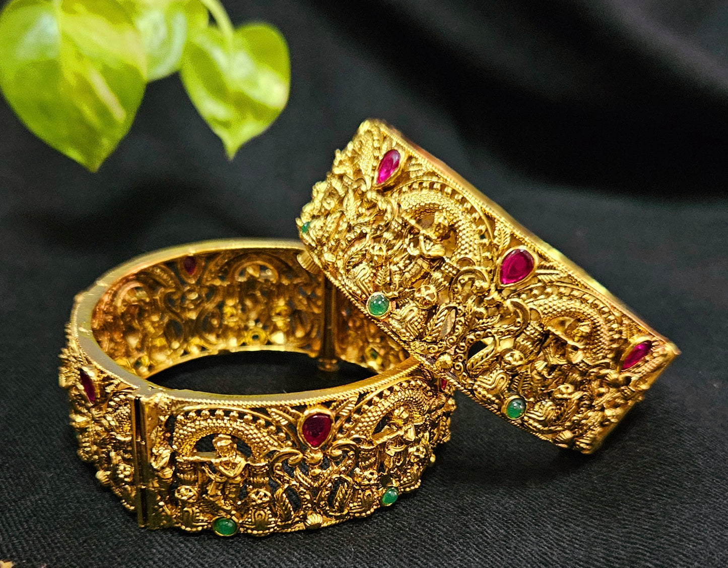 Gold finish temple jewelry kara (bangles) with intricate carving of Krishna playing flute (2 pcs)