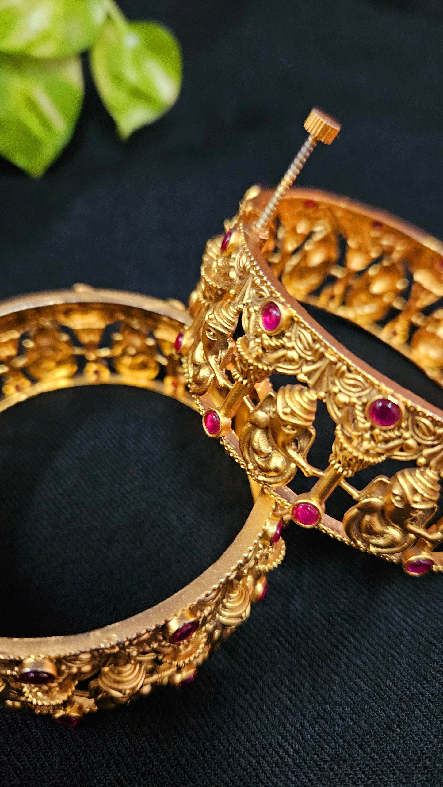 Gold finish temple jewelry kara (bangles) with intricate carving of Lord Ganesha (2 pcs)