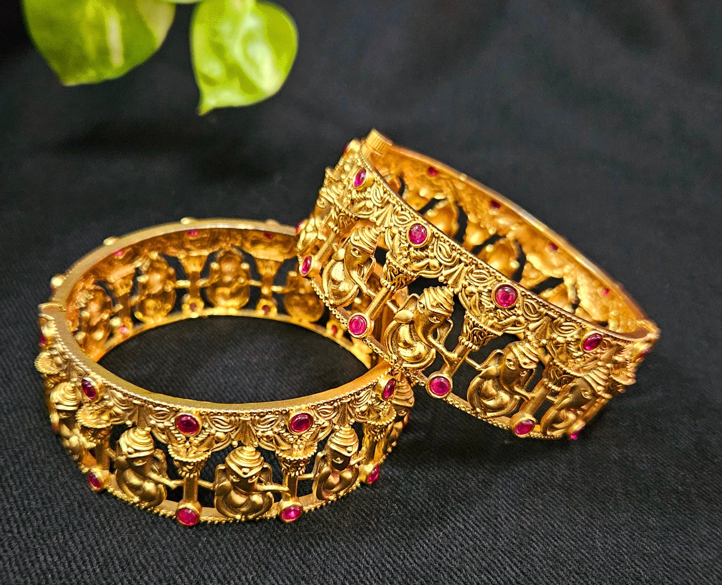 Gold finish temple jewelry kara (bangles) with intricate carving of Lord Ganesha (2 pcs)