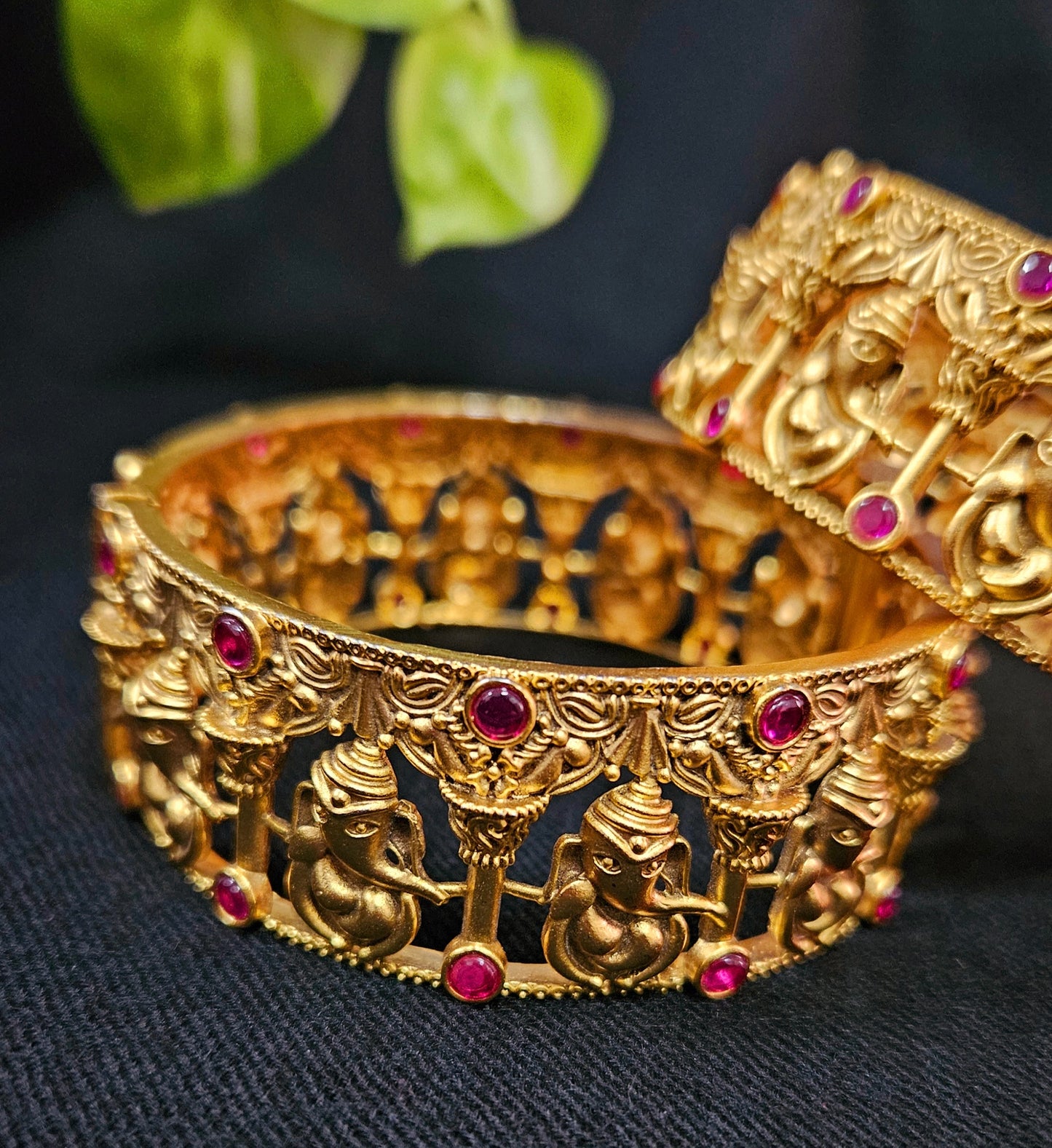 Gold finish temple jewelry kara (bangles) with intricate carving of Lord Ganesha (2 pcs)