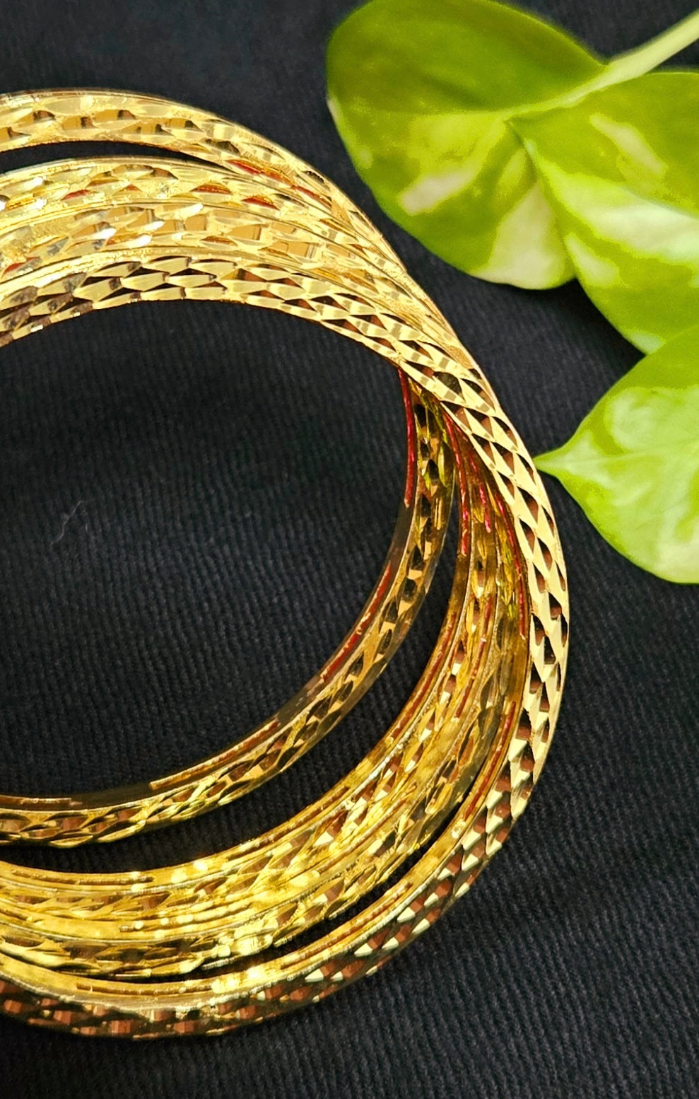 Gold finish sleek bangles with small cylindrical crystal/ruby/emerald/sapphire (4 pcs)