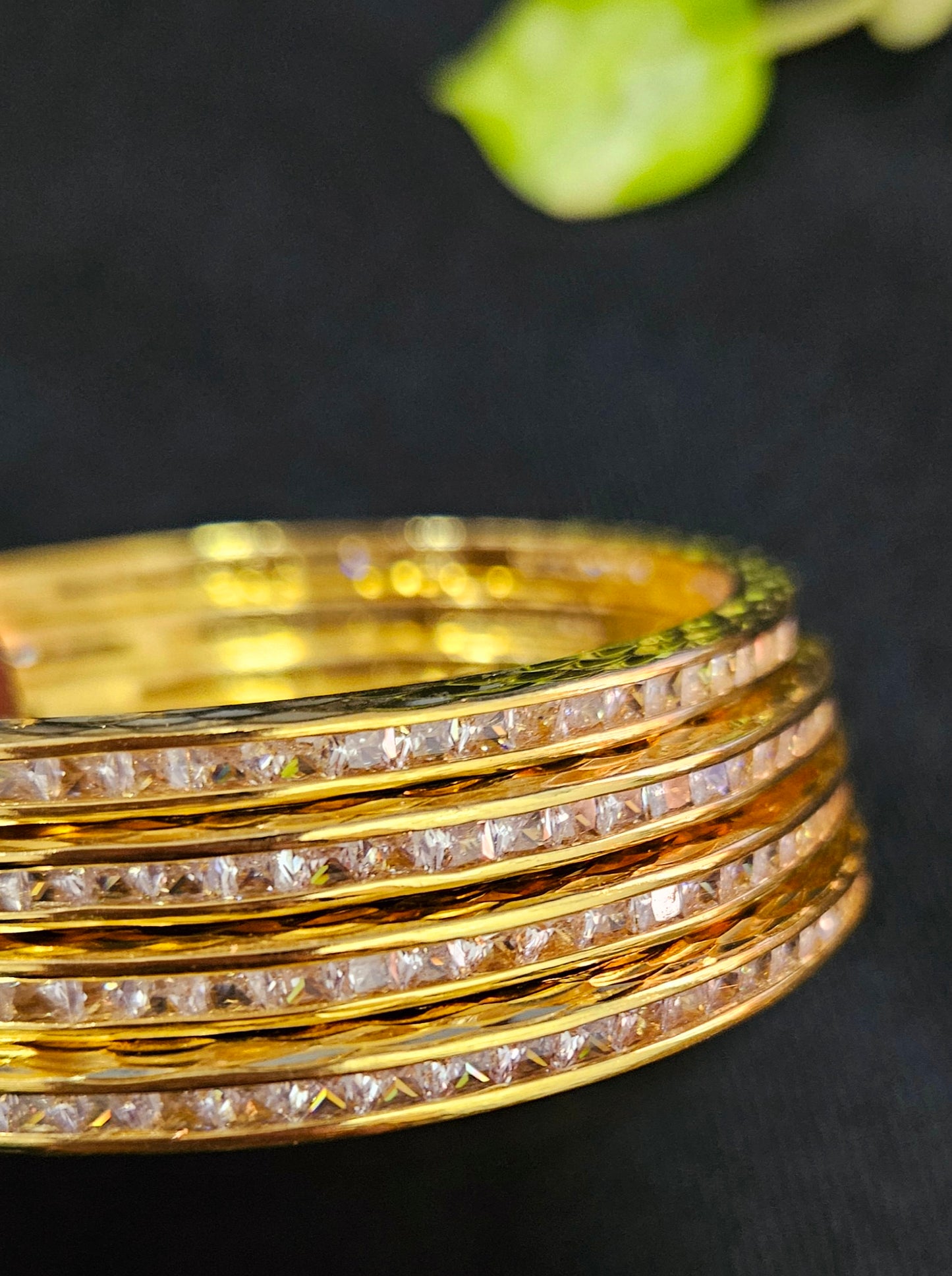 Gold finish sleek bangles with small cylindrical crystal/ruby/emerald/sapphire (4 pcs)