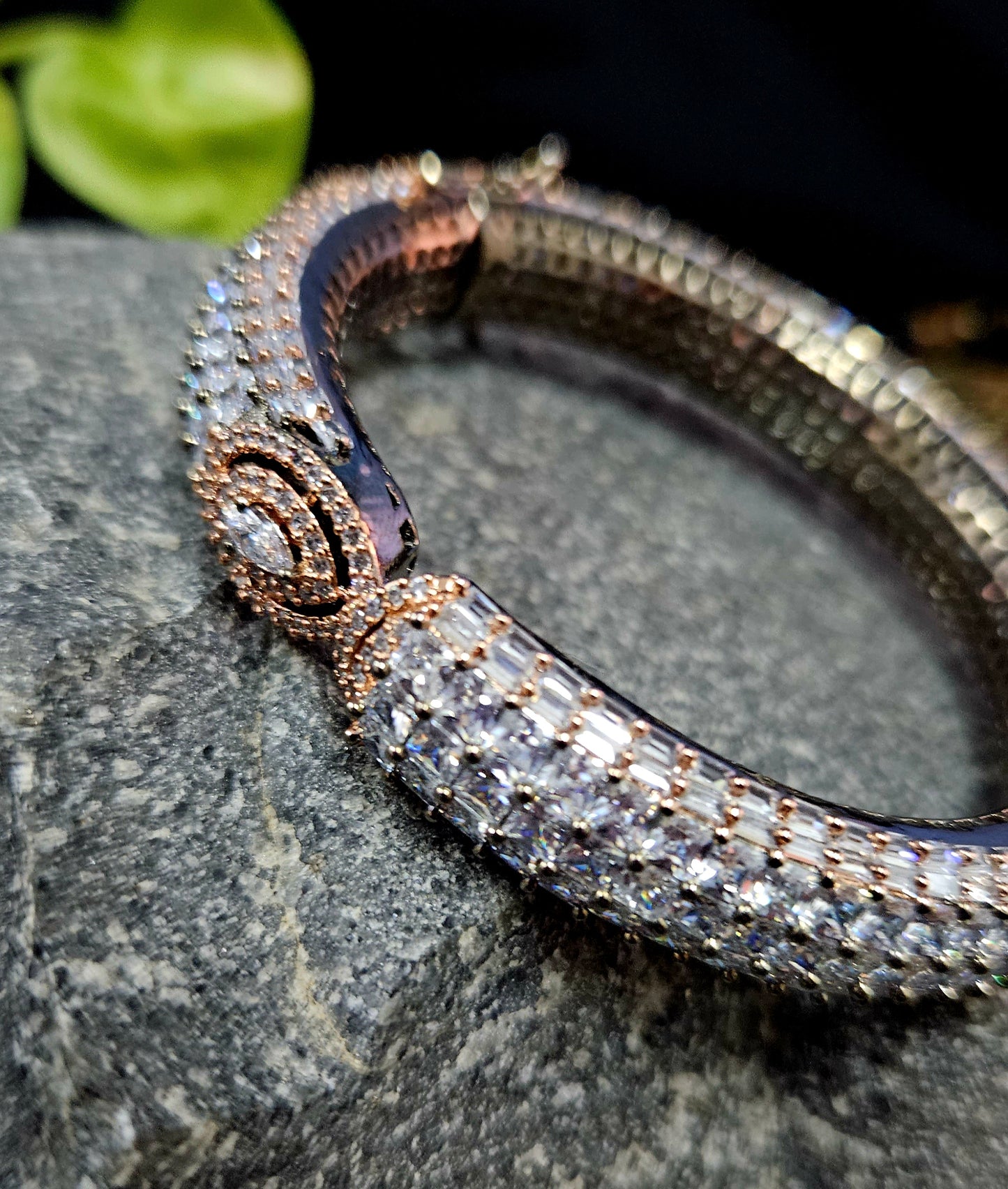 Antique platinum finish kara (bangle) with CZ encrusted all over and one paisley design in centre