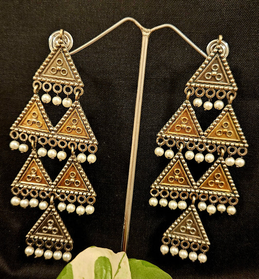 Dual tone earrings with metal triangular pieces with pearl beads