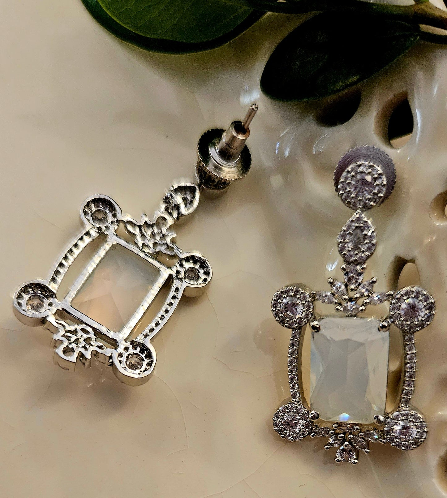 Platinum finish set with Milky white rectangular doublet pendant in CZ frame, matching earrings