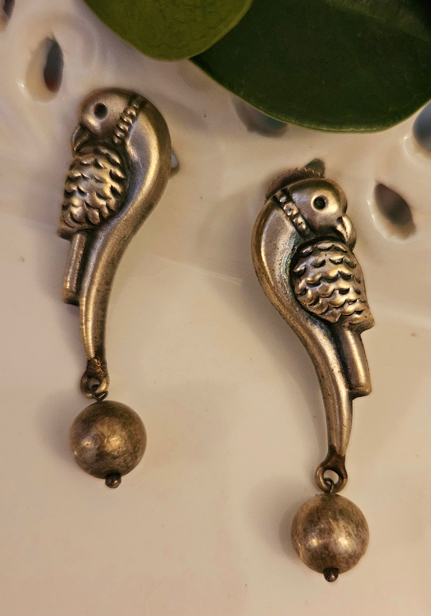 Dual tone set, round pendant with Lakshmi and parrot motif in beads and metal bead necklace, matching parrot studs (earrings)