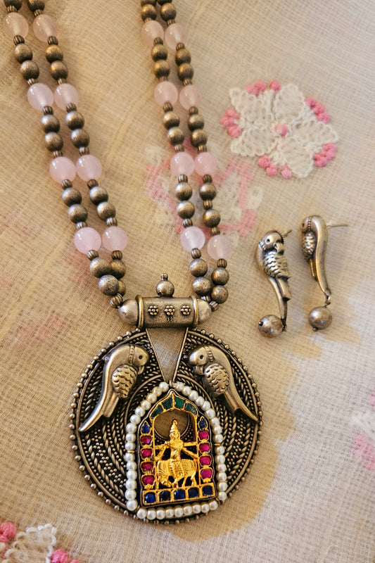 Dual tone set, round pendant with Lakshmi and parrot motif in beads and metal bead necklace, matching parrot studs (earrings)