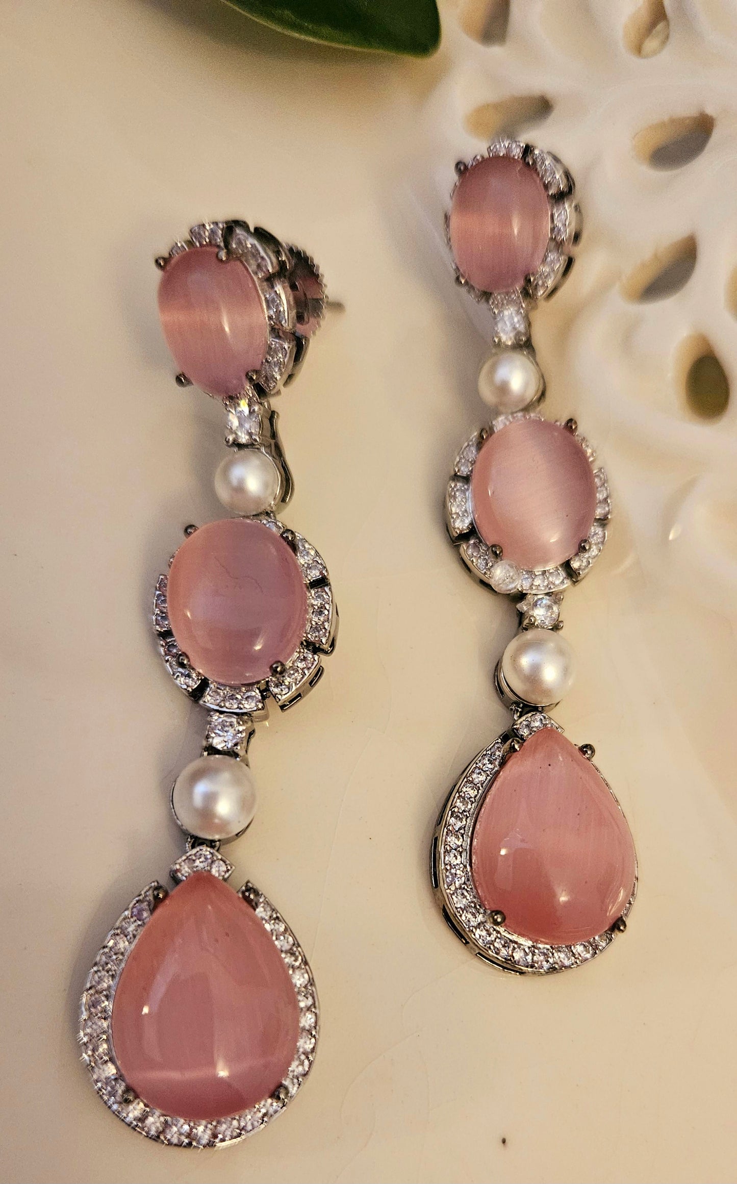 Platinum finish set with teardrop sapphire/pink stone set with pearl and CZ, matching earrings