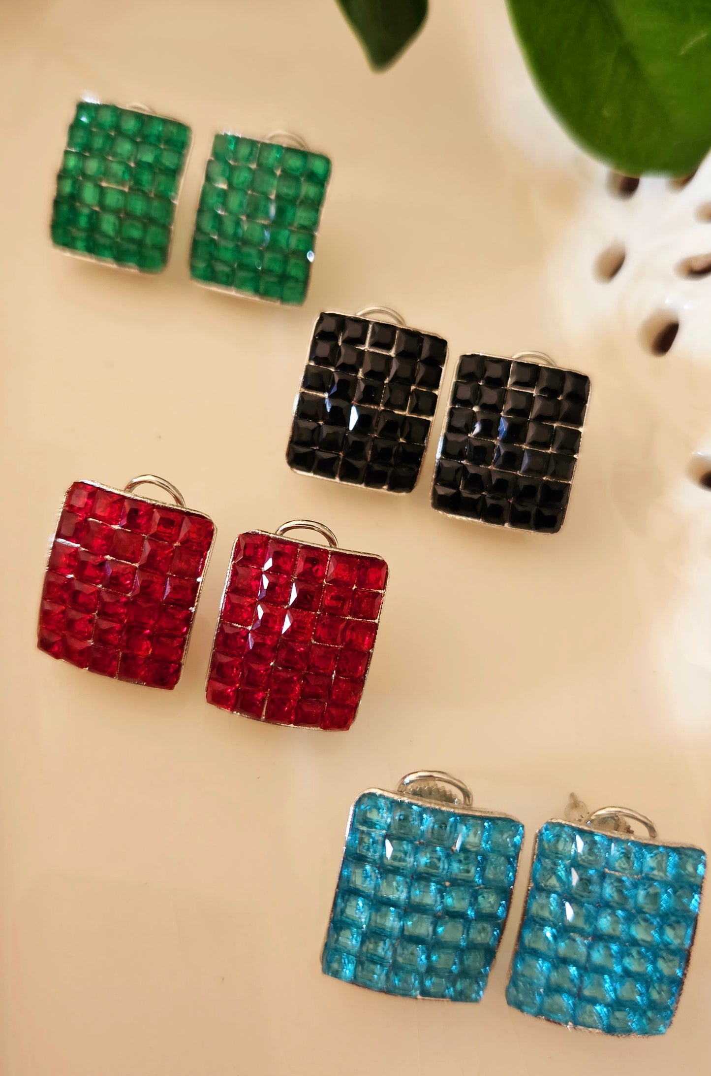 Platinum finish pendant set with green/black/red/blue stone set in rectangle pendant, matching studs (earrings)