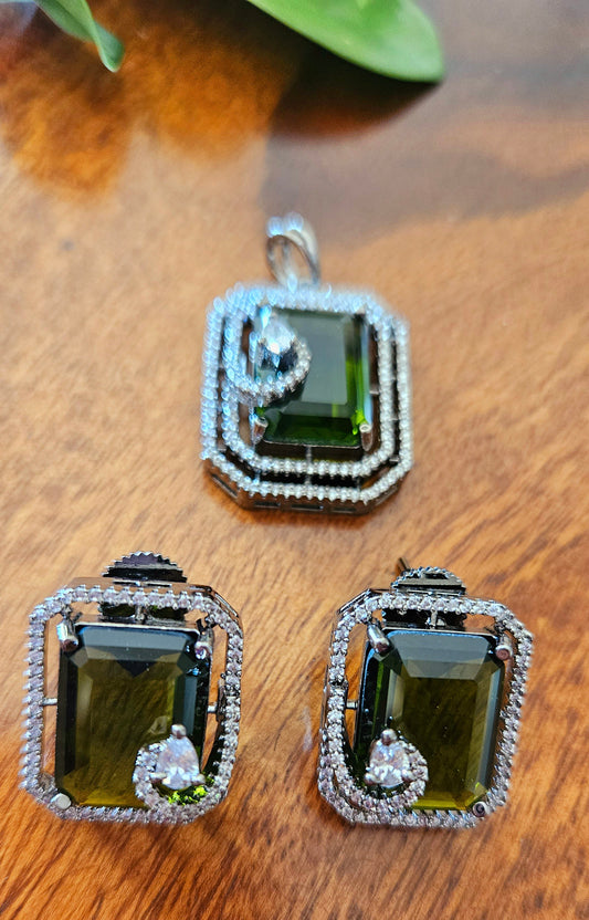 Platinum finish pendant set in topaz/green/moss green stone accentuated with CZ, matching studs (earrings)