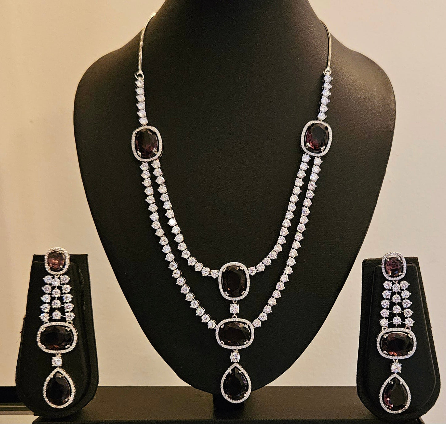 Platinum finish purple stone and CZ set, two layered necklace and matching earrings