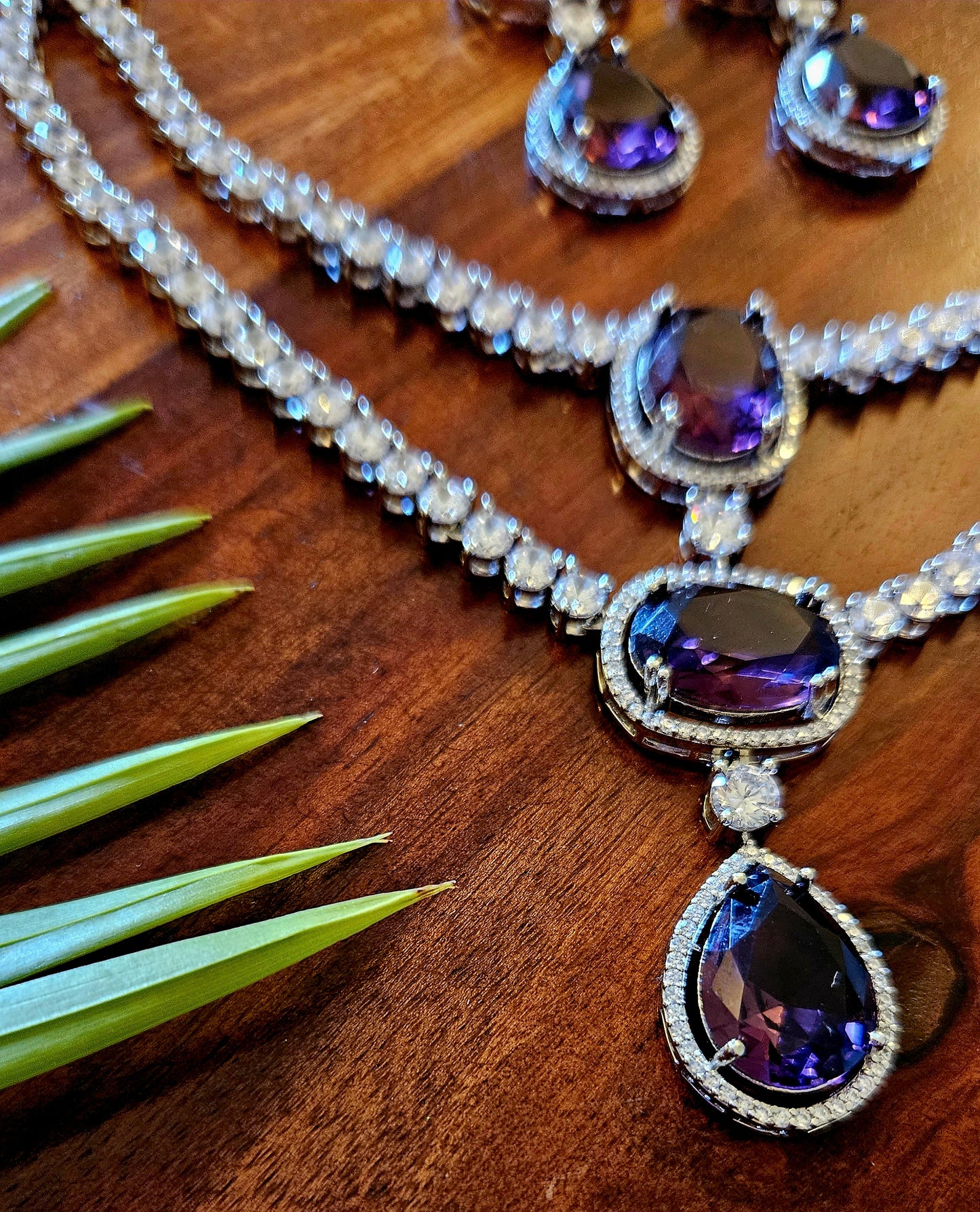 Platinum finish purple stone and CZ set, two layered necklace and matching earrings