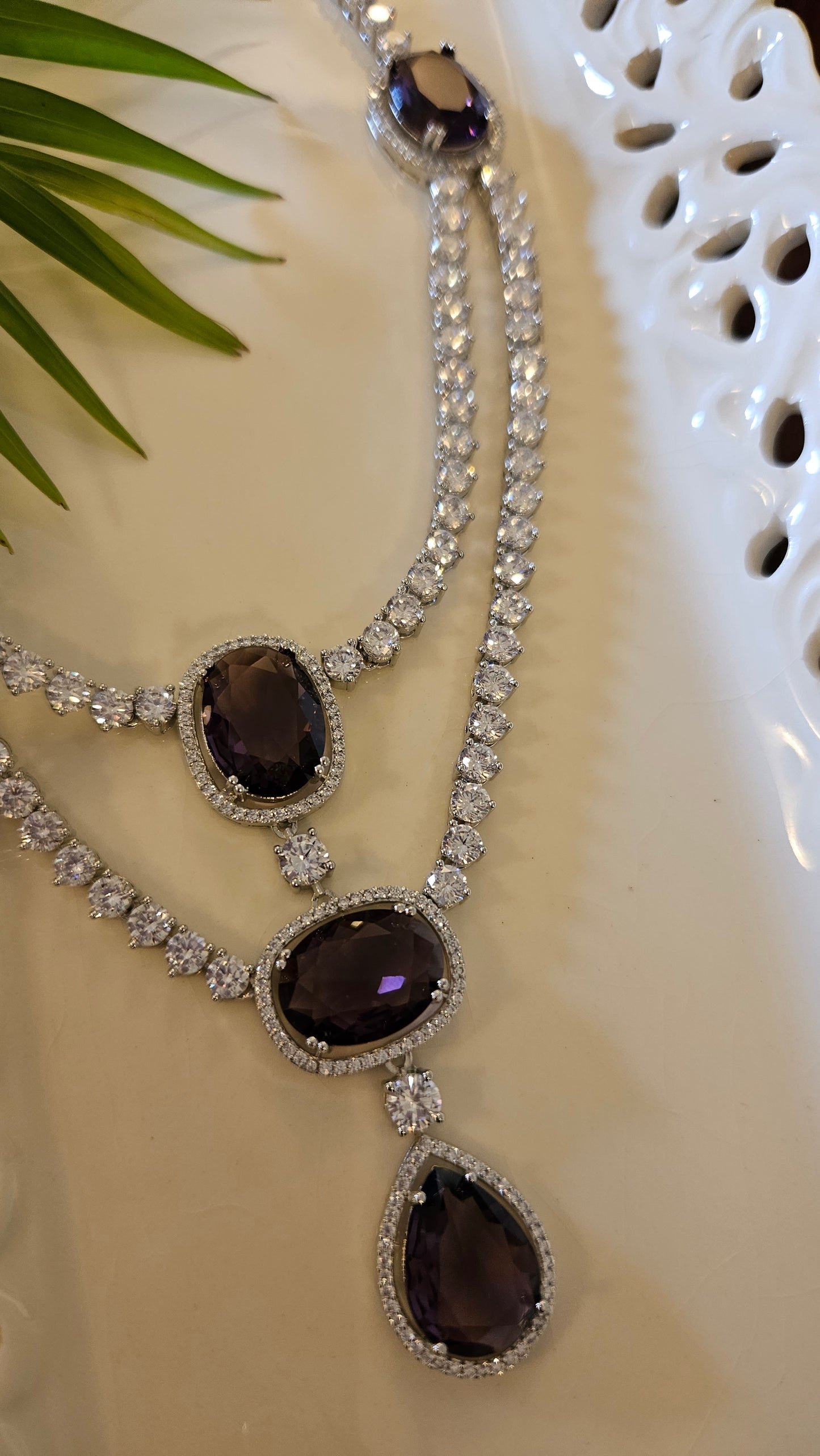 Platinum finish purple stone and CZ set, two layered necklace and matching earrings