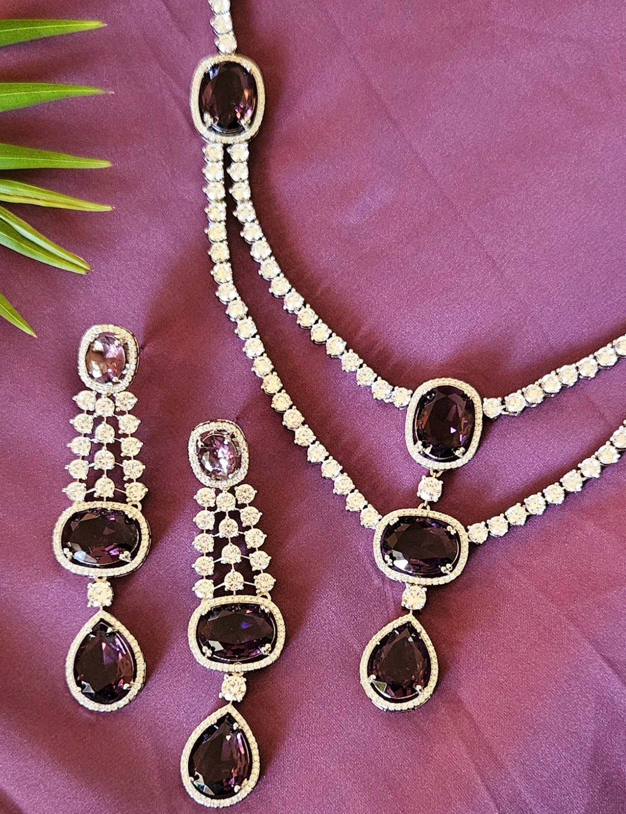 Platinum finish purple stone and CZ set, two layered necklace and matching earrings