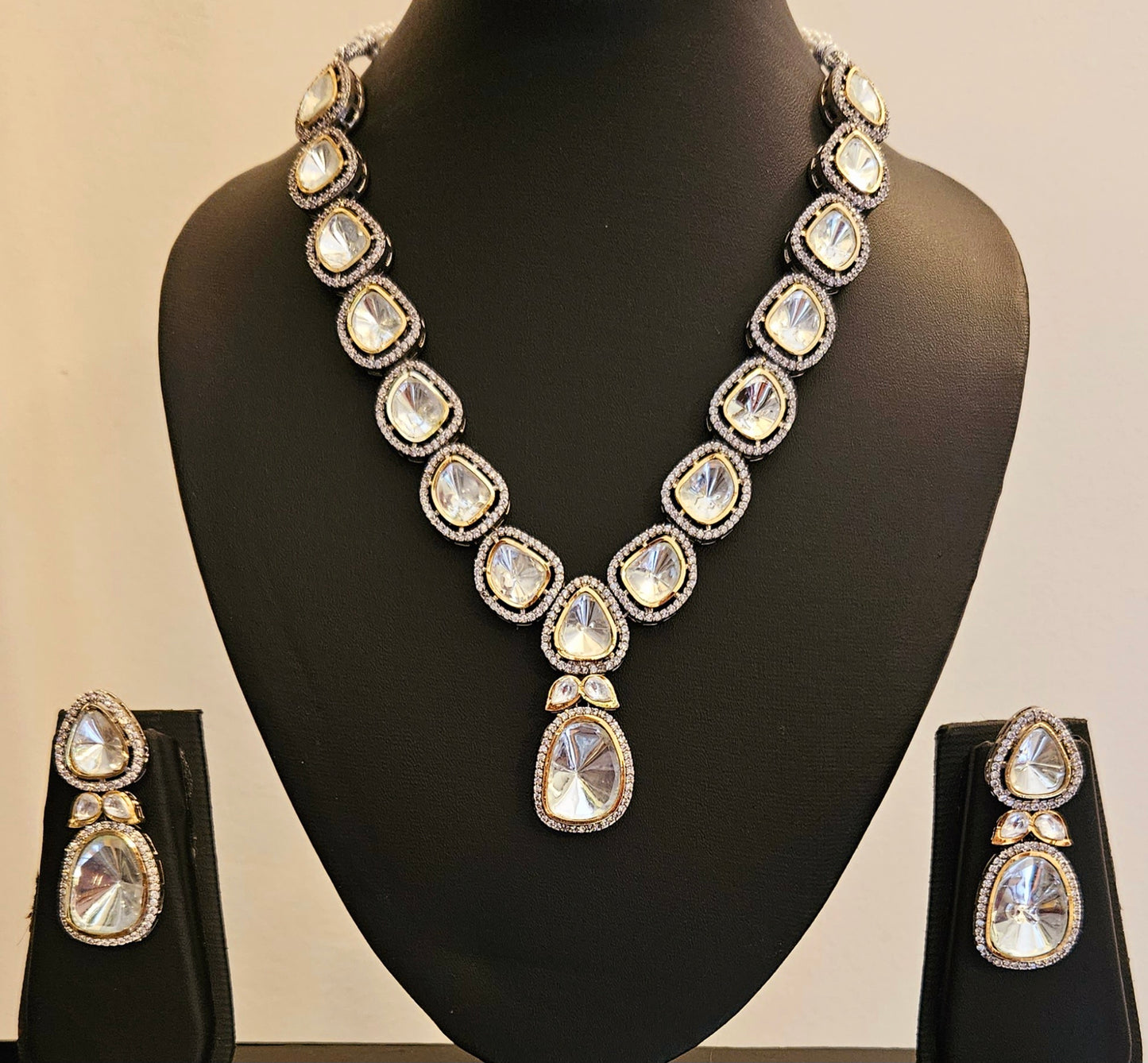 Silver finish kundan set with big kundan and CZ, matching earrings