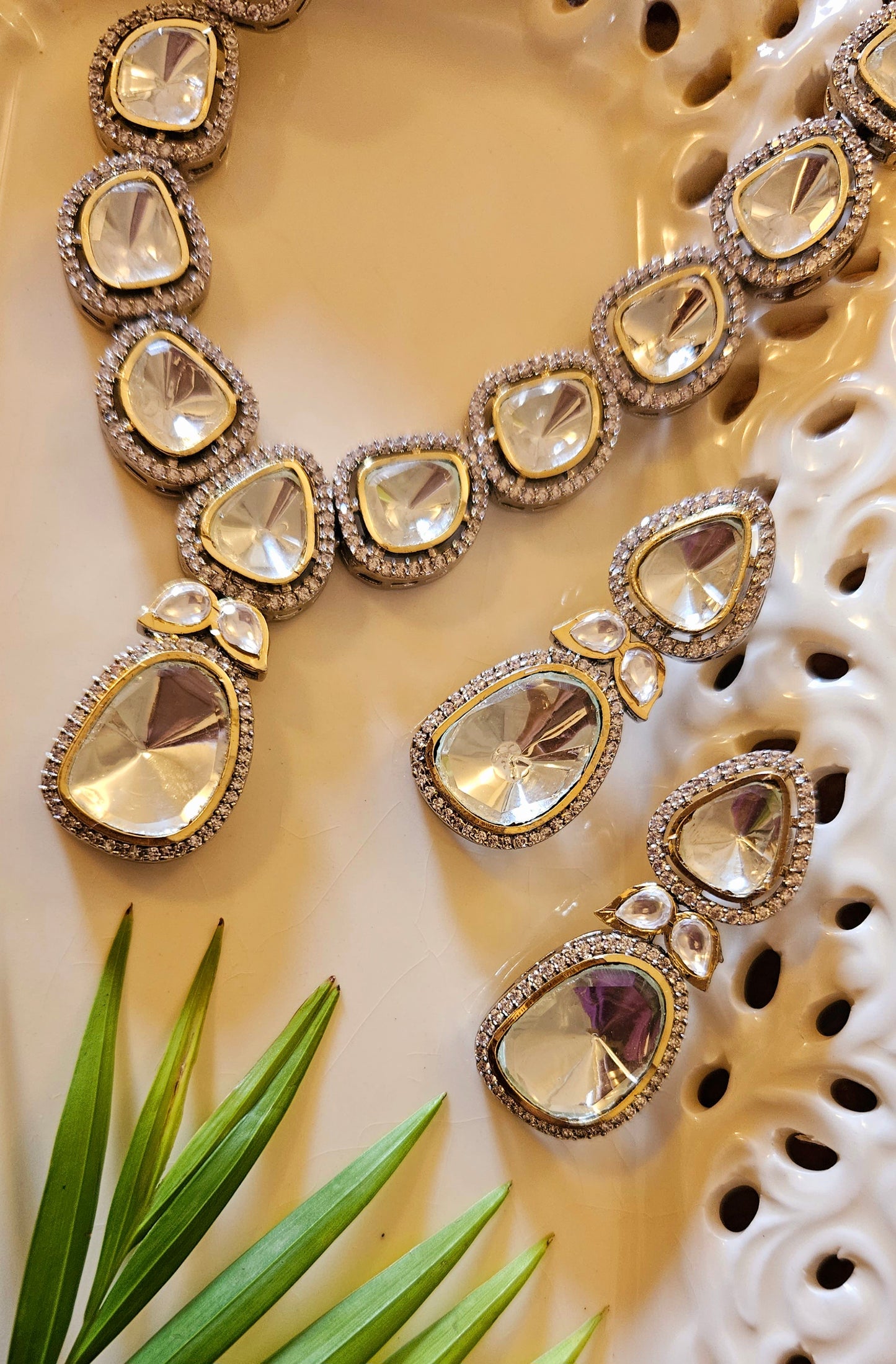 Silver finish kundan set with big kundan and CZ, matching earrings